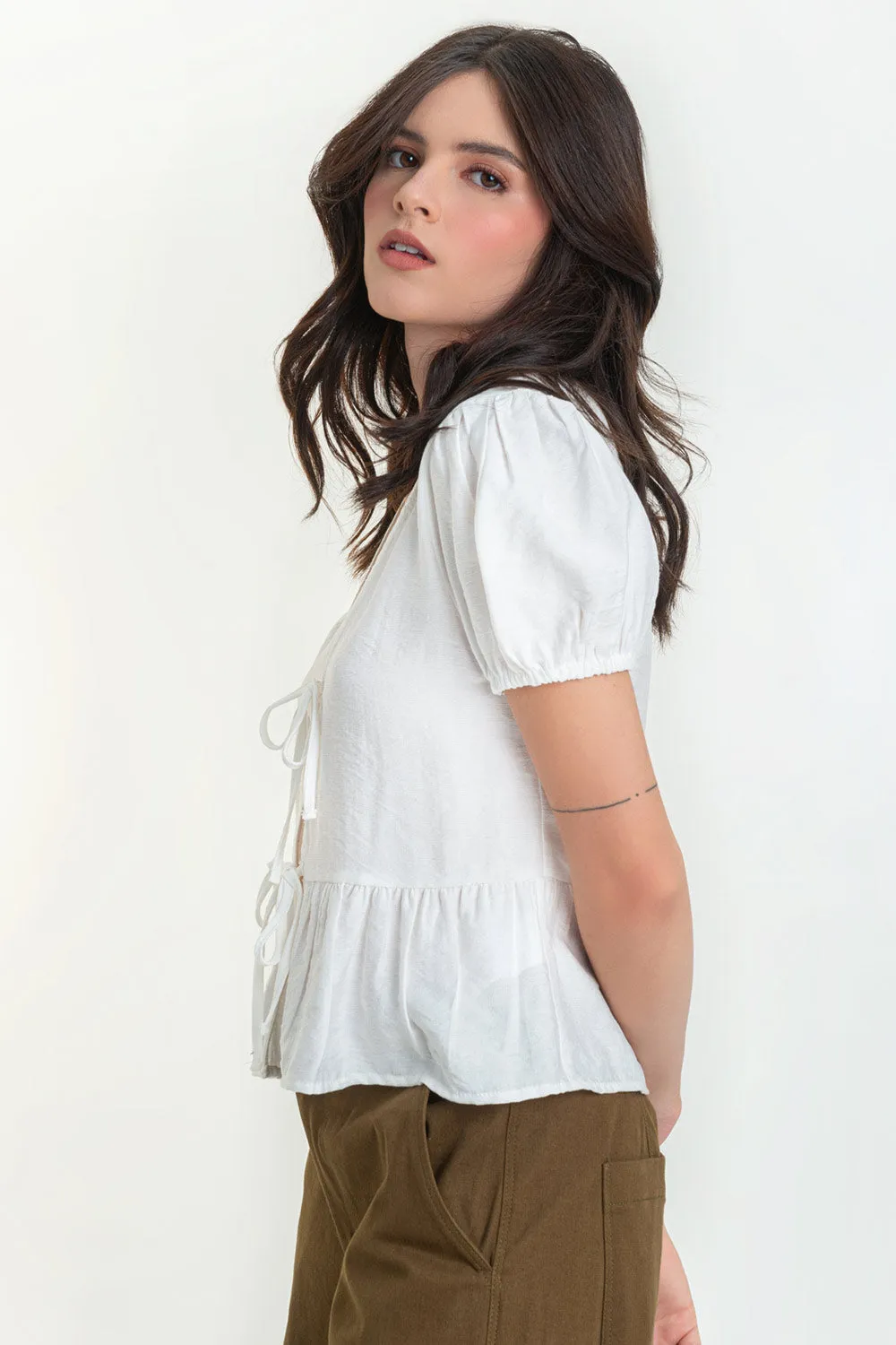 Blusa de escote con lazos peplum olanes